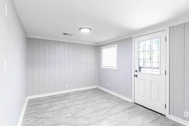 an empty room with windows