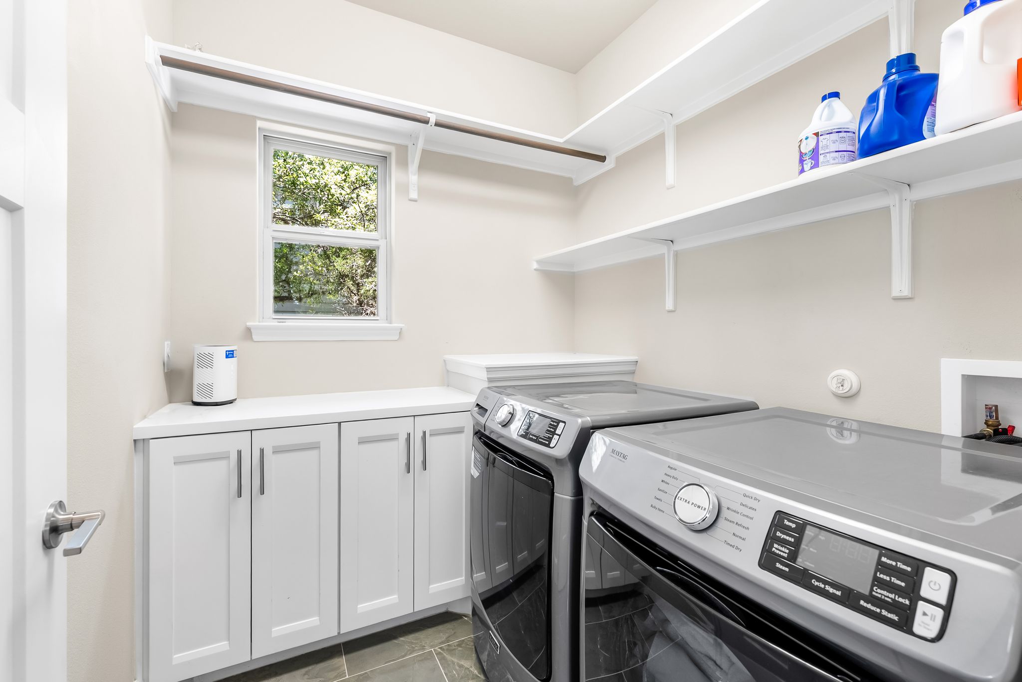 14213 Red Feather Trail Austin, TX 78734 - Photo 28 of 39 a utility room with dryer and washer