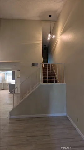 a view of gallery with wooden floor