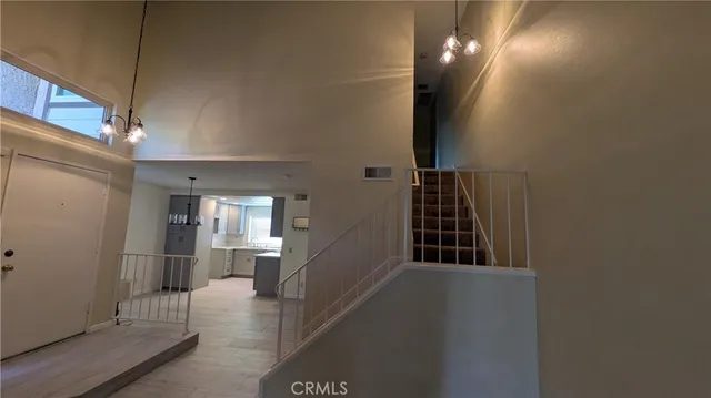 a view of backyard with tub and outdoor seating