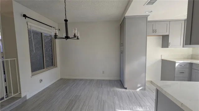 a view of a kitchen cabinets a sink and dishwasher in a kitchen