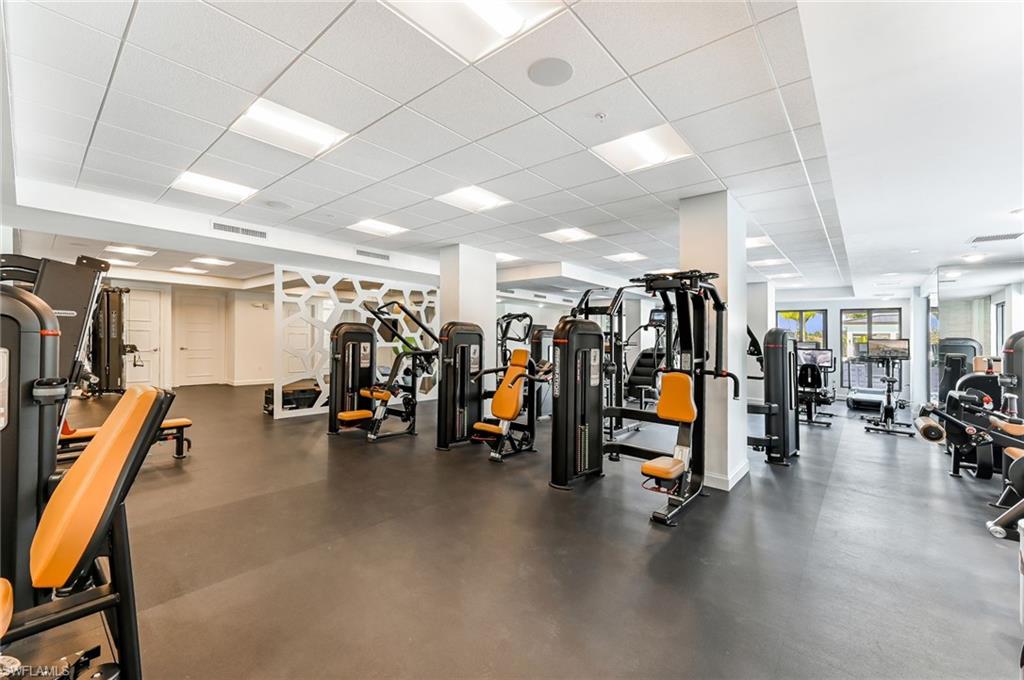 1111 Central, Unit 417A Naples, FL 34104 - Photo 19 of 25 a view of a room with gym equipment
