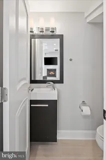 a kitchen with a sink and a microwave