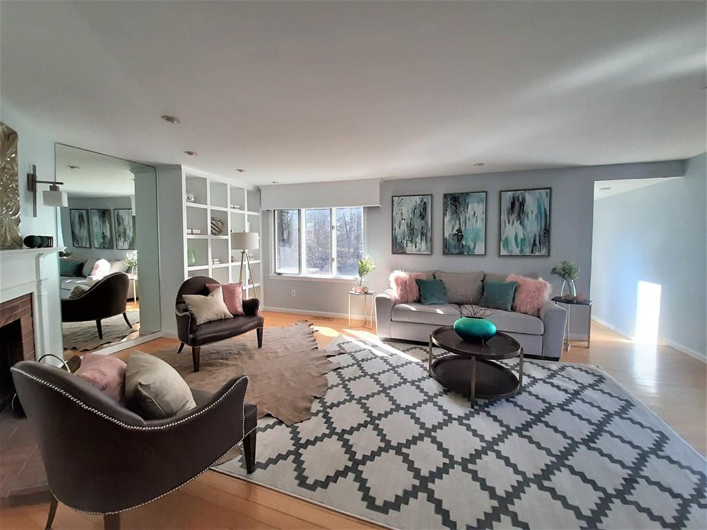 2 Daybreak, Unit 2 Wayland, MA 01778 - Photo 1 of 27 a living room with furniture and a couch