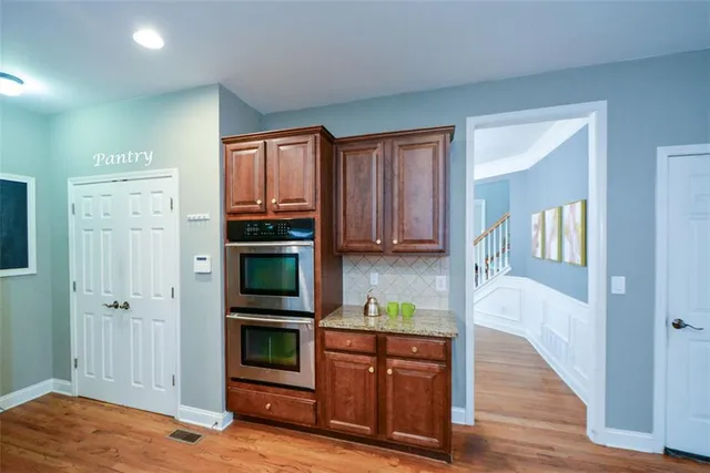 a media room with lots of chairs and a projector screen