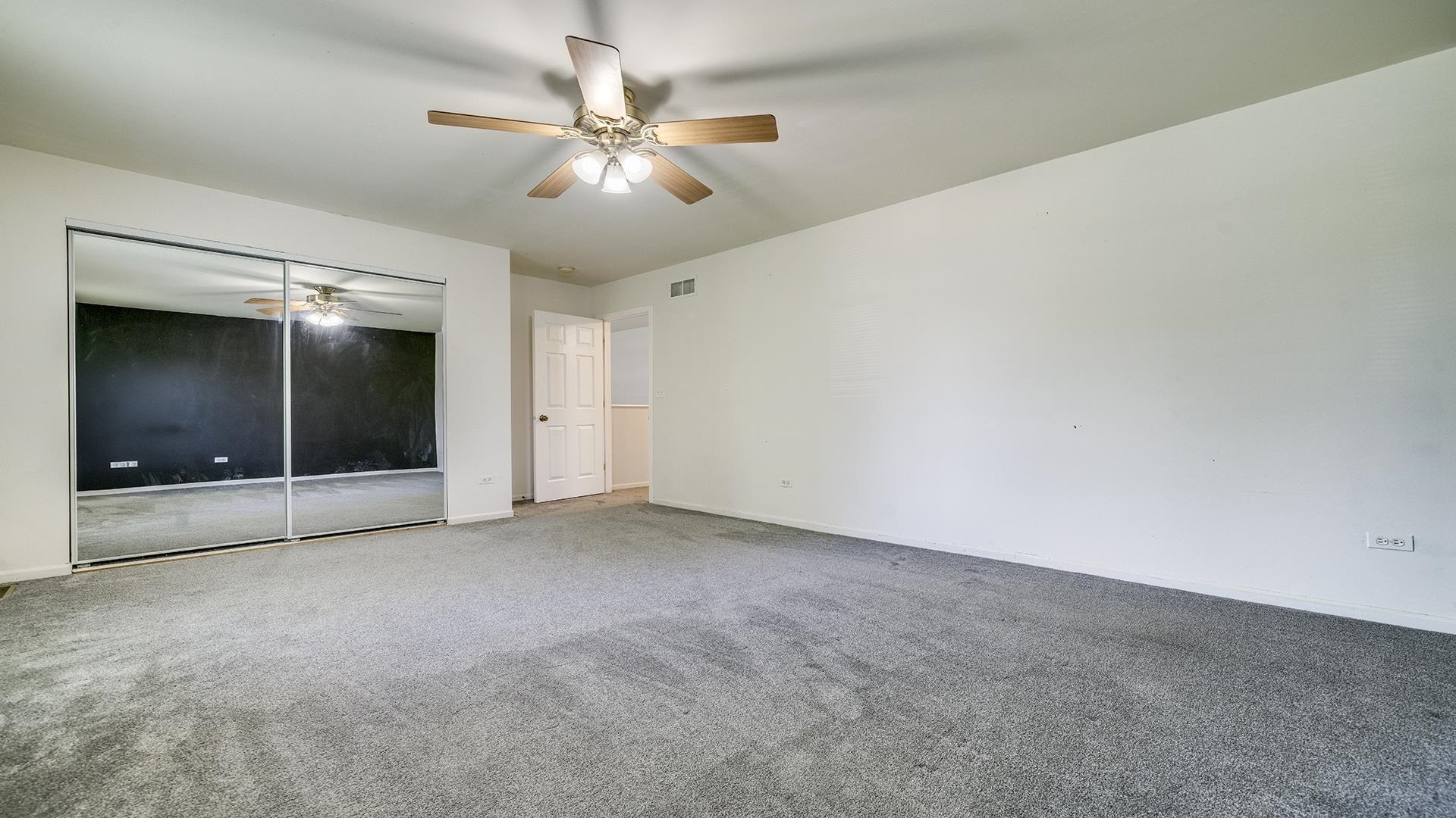 7903 Graf Road Harvard, IL 60033 - Photo 27 of 52 an empty room with fan