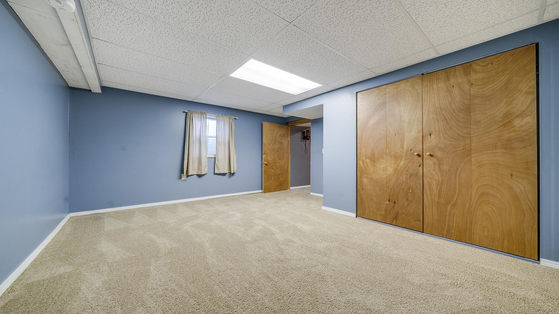 7903 Graf Road Harvard, IL 60033 - Photo 36 of 52 a view of an empty room with a window