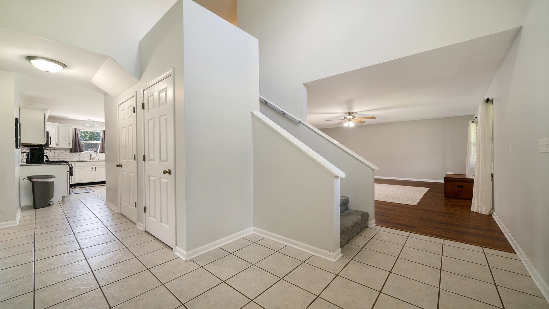 7903 Graf Road Harvard, IL 60033 - Photo 4 of 52 a view of a kitchen with white cabinets and entryway