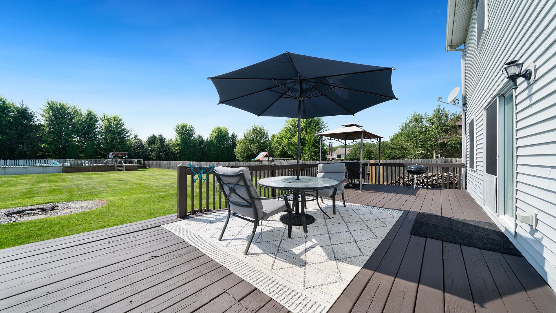 7903 Graf Road Harvard, IL 60033 - Photo 41 of 52 a view of a deck with furniture