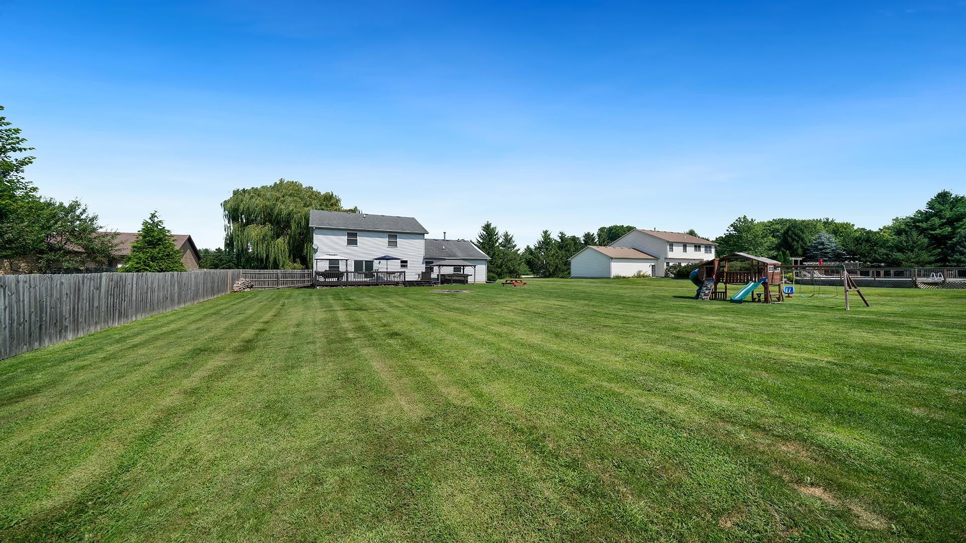 7903 Graf Road Harvard, IL 60033 - Photo 49 of 52 a house view with a garden space