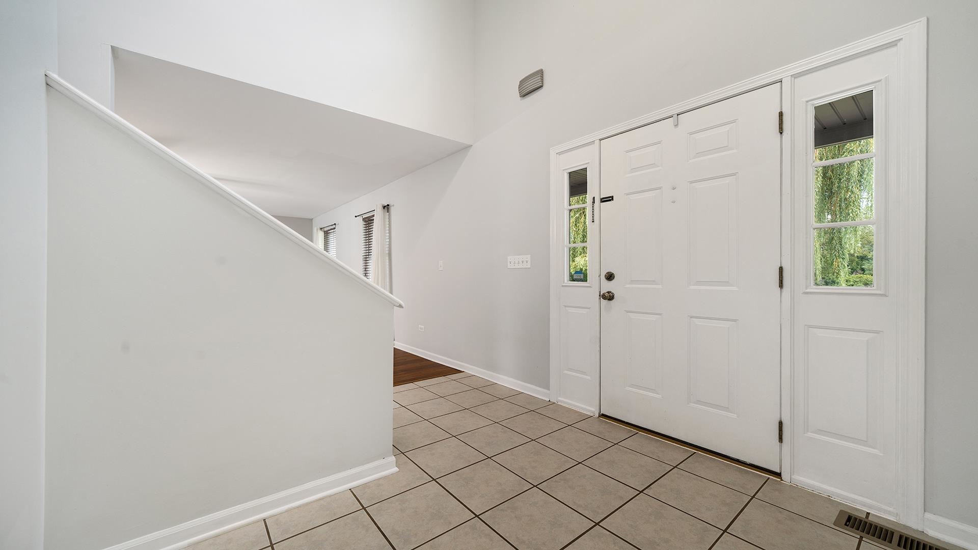 7903 Graf Road Harvard, IL 60033 - Photo 5 of 52 a view of a hallway view with staircase