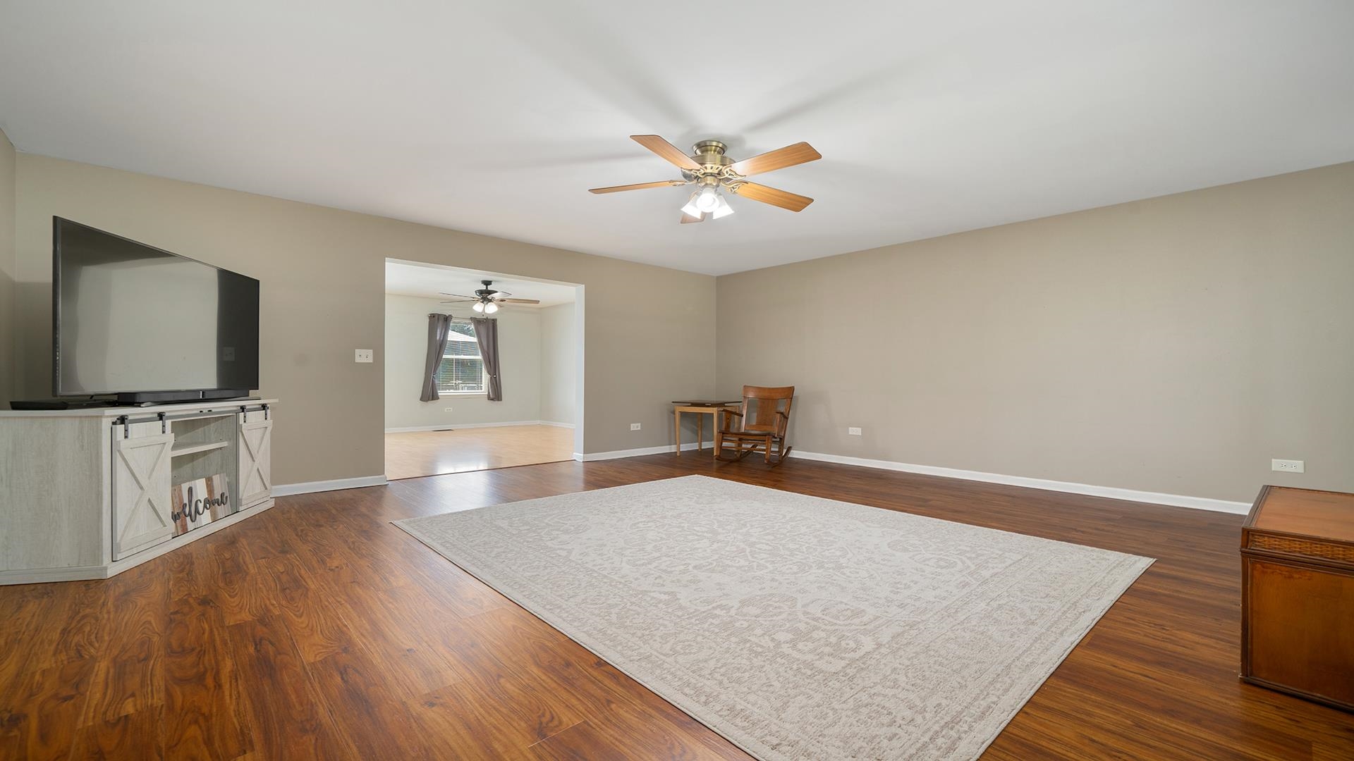 7903 Graf Road Harvard, IL 60033 - Photo 7 of 52 a living room with furniture and a flat screen tv