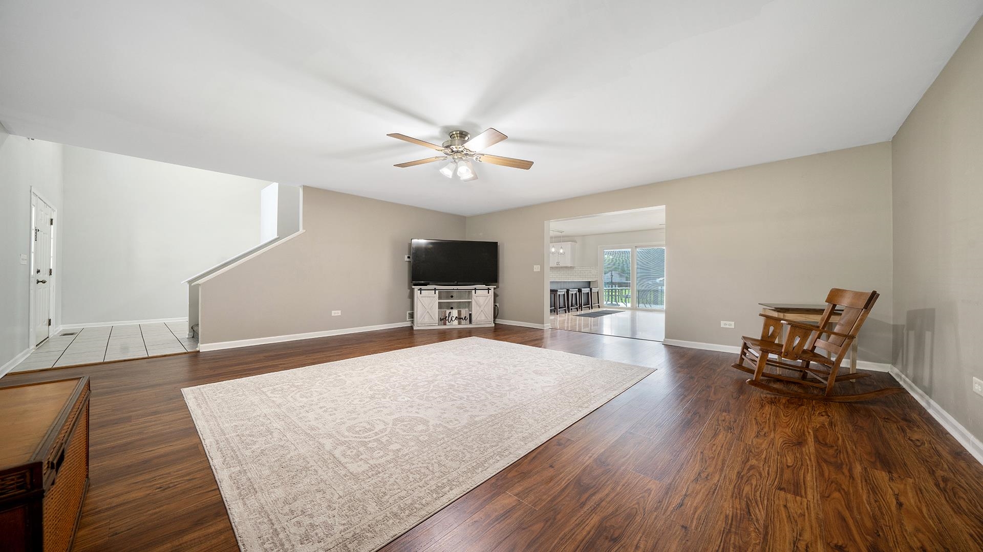 7903 Graf Road Harvard, IL 60033 - Photo 9 of 52 a living room with furniture and a wooden floor
