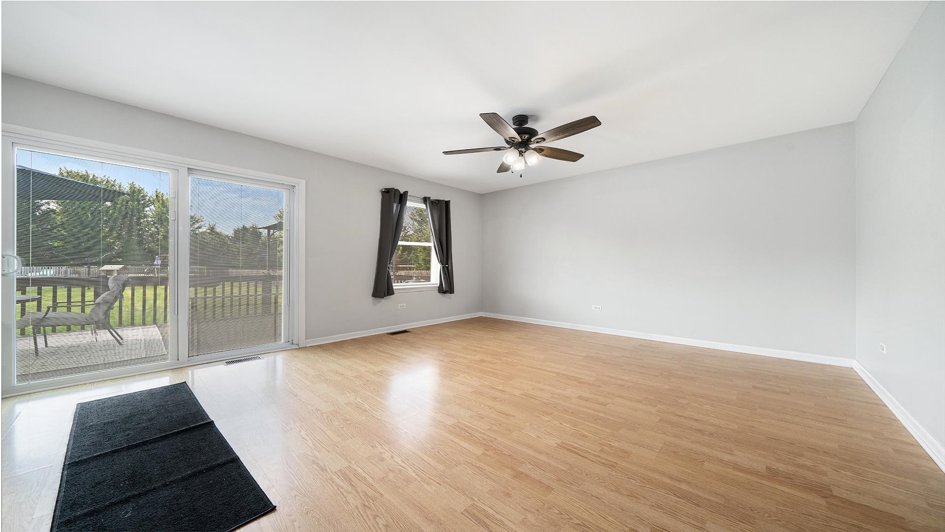 7903 Graf Road Harvard, IL 60033 - Photo 10 of 52 a view of an empty room with a window