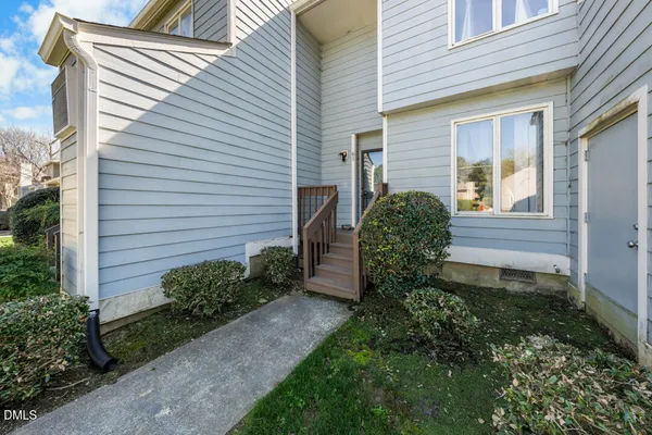 a view of a backyard of the house