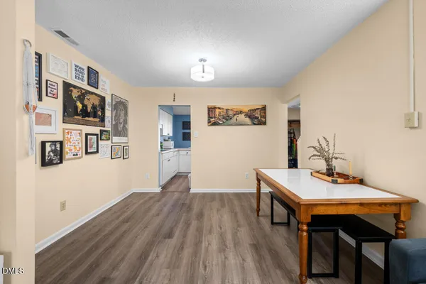 a workspace with furniture and wooden floor