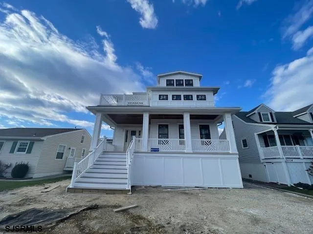 a view of a house with a roof deck