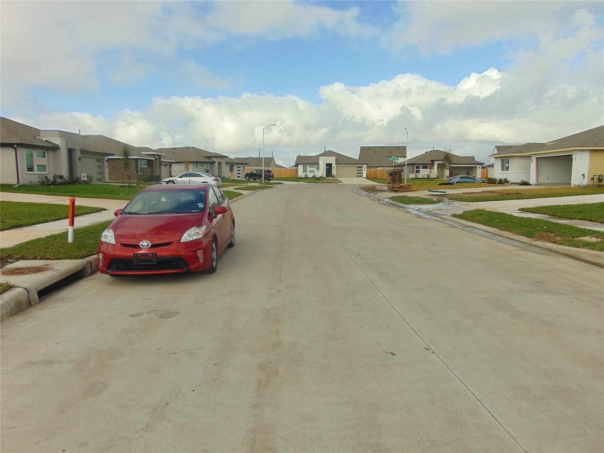6918 Morales Way Richmond, TX 77469 - Photo 17 of 17 a car parked on the side of the road