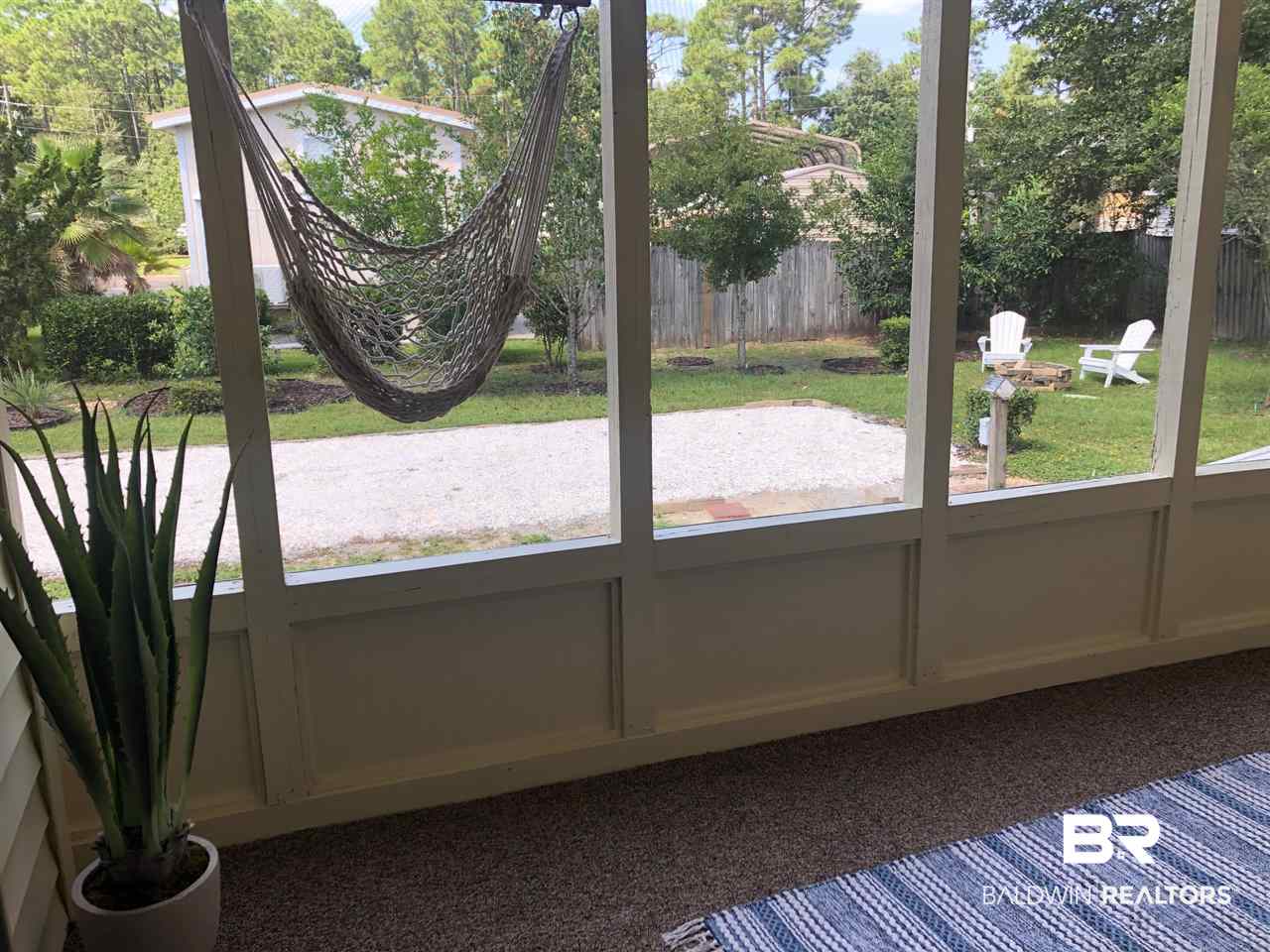 129 Defuniak Loop Lillian, AL 36549 - Photo 13 of 22 Large Screened Porch