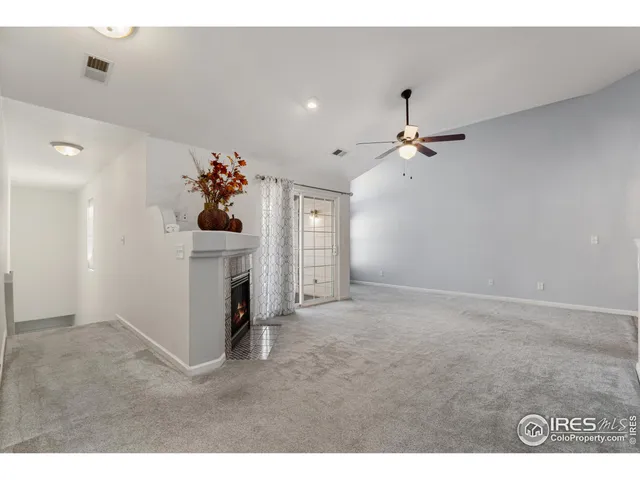 a view of a livingroom with a fireplace