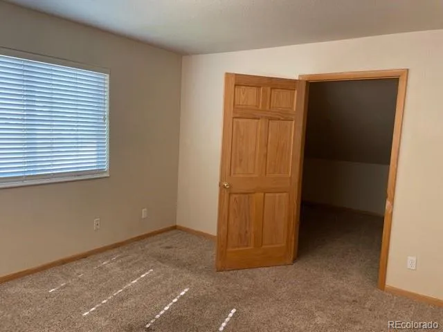 an empty room with closet