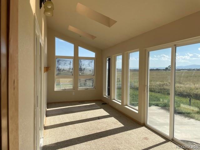 12508 Arapahoe Road Erie, CO 80516 - Photo 7 of 17 a view of a room with a large window