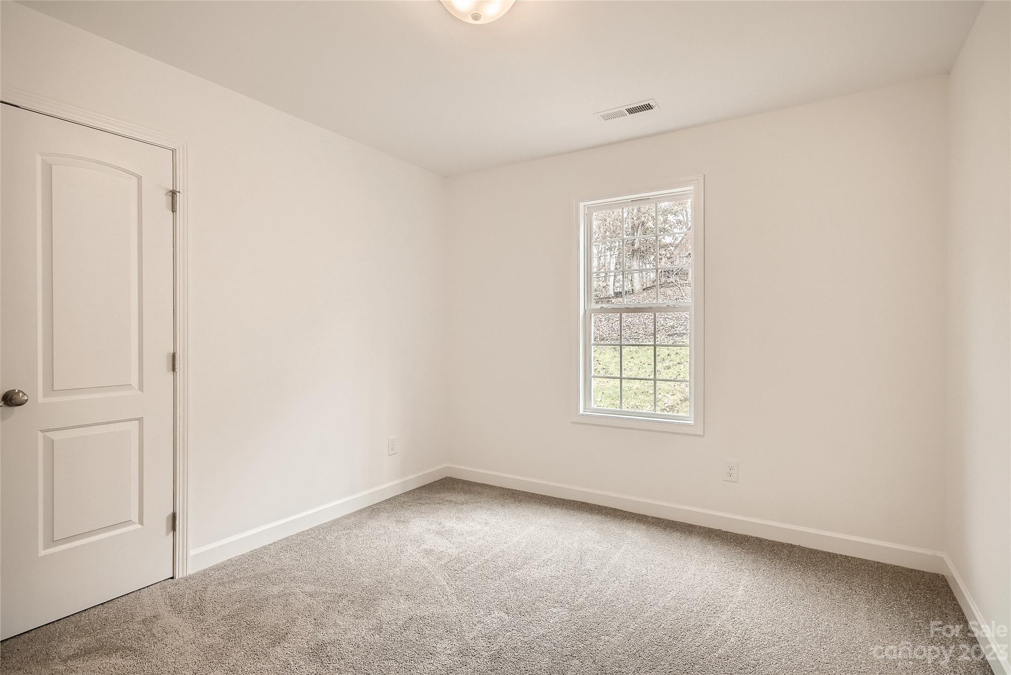 1526 Shepard Street Kannapolis, NC 28083 - Photo 7 of 10 an empty room with a window
