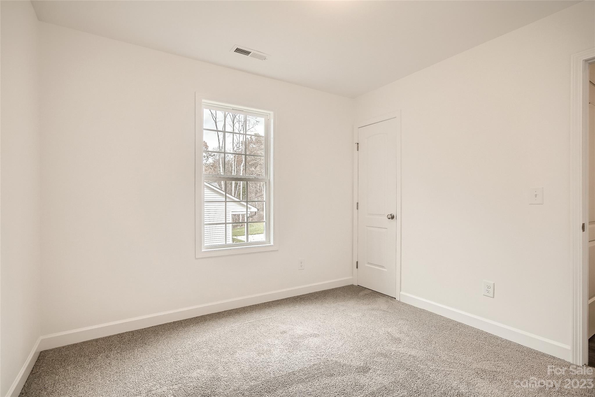 1526 Shepard Street Kannapolis, NC 28083 - Photo 9 of 10 an empty room with a window