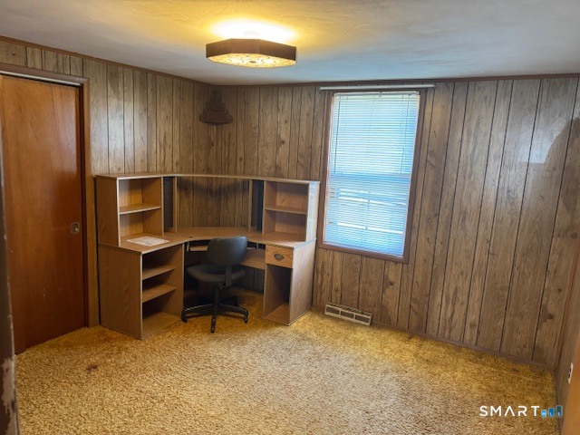 661 Riverside Drive Thompson, CT 06255 - Photo 5 of 11 a room that has a bed and a chair in it