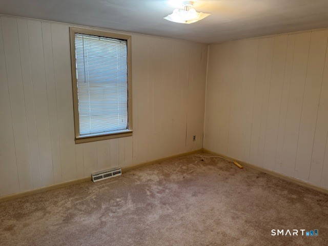 661 Riverside Drive Thompson, CT 06255 - Photo 6 of 11 an empty room with a window