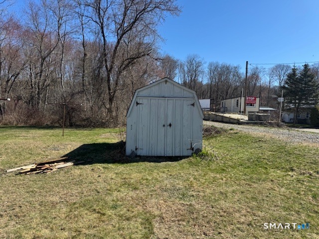 661 Riverside Drive Thompson, CT 06255 - Photo 10 of 11 a view of a back yard of the house