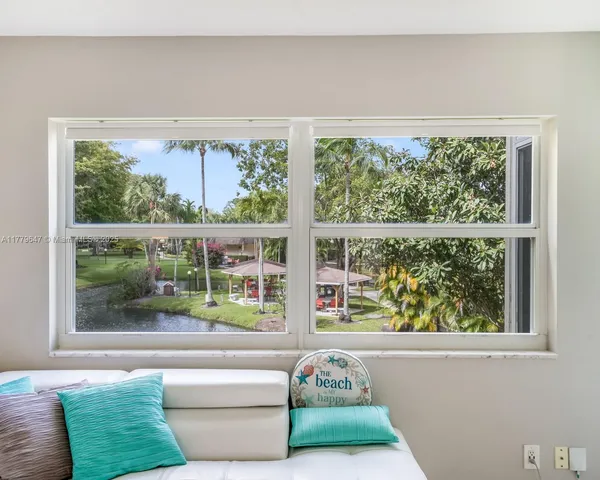 a view of a living room and a window