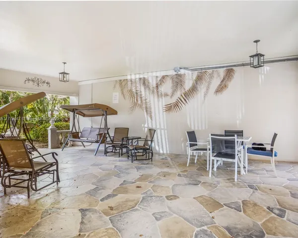 a view of a dinning tables and chairs in the room