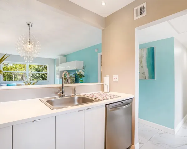 a room with sink and window