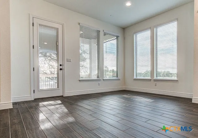 a kitchen with stainless steel appliances a refrigerator sink and cabinets