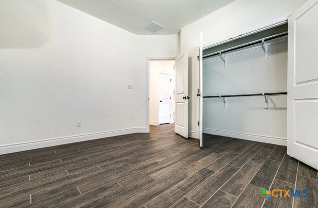 a bathroom with a sink double vanity and a mirror