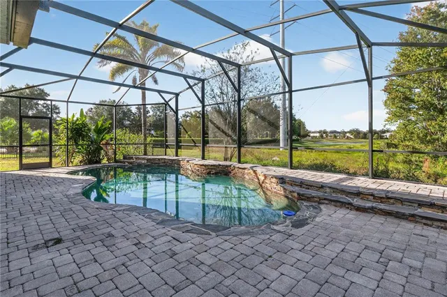 a view of a balcony with a floor to ceiling window