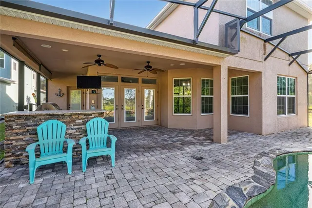 a bathroom with a sink vanity and mirror