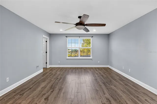 an aerial view of a city with lawn chairs