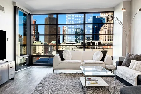 $1,395,000 | 580 Washington Street, Unit 1407, Boston, MA 02111