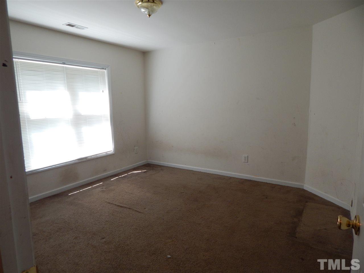 128 Randolph Drive Clayton, NC 27520 - Photo 9 of 15 Walk-in closet!