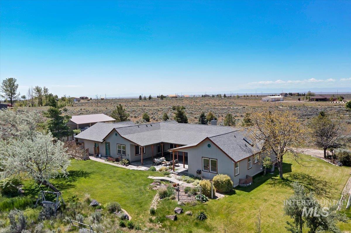 147 East Indian Crk Road Boise, ID 83716 - Photo 40 of 43 Ranch-style residence featuring a gray exterior and dark shingle roof