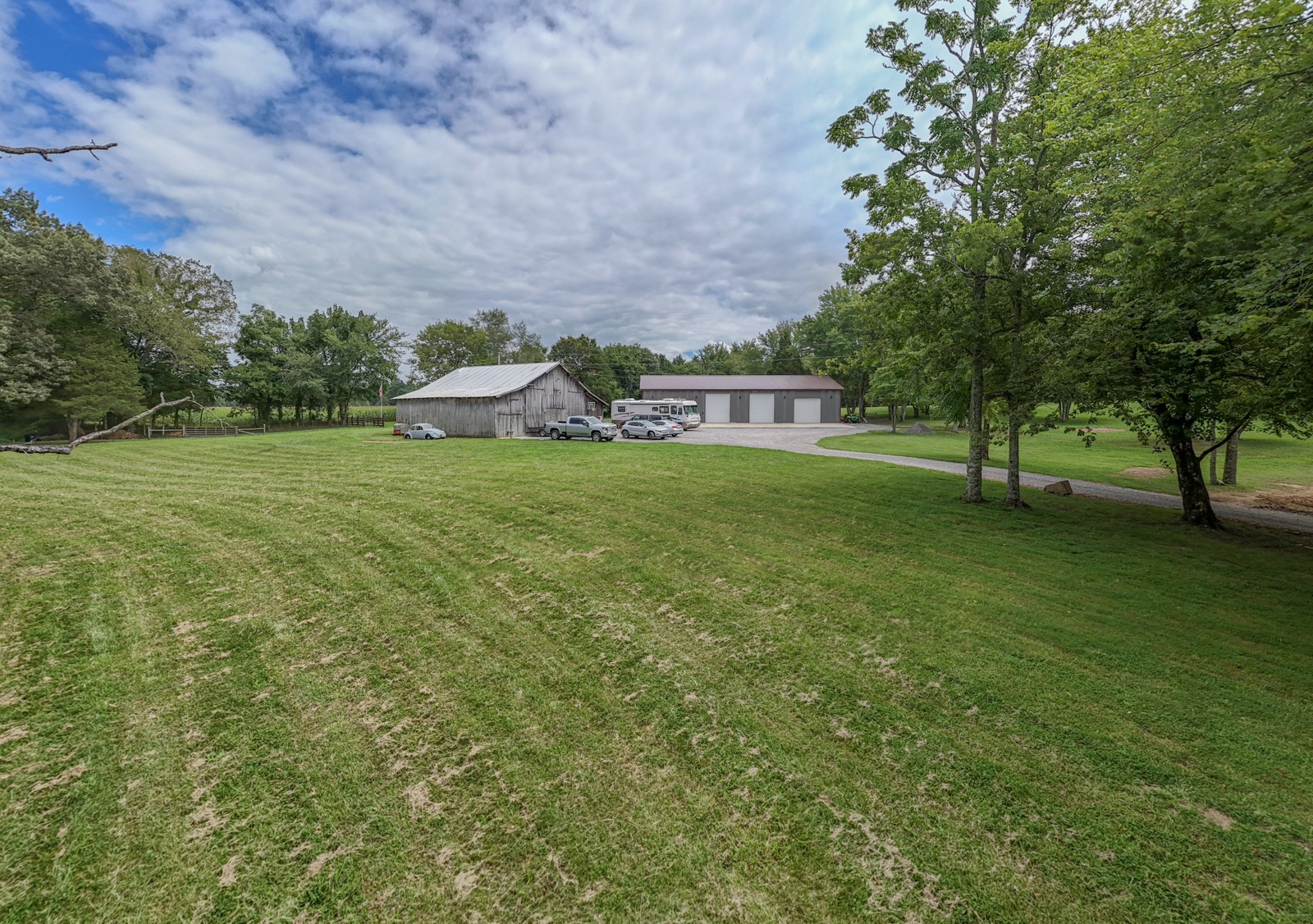 118 Robert Simmons Road Westmoreland, TN 37186 - Photo 53 of 82 a backyard of a house with lots of green space