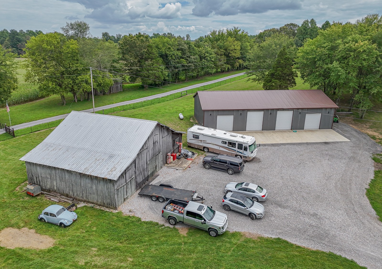 118 Robert Simmons Road Westmoreland, TN 37186 - Photo 63 of 82 an aerial view of a house with garden space and street view