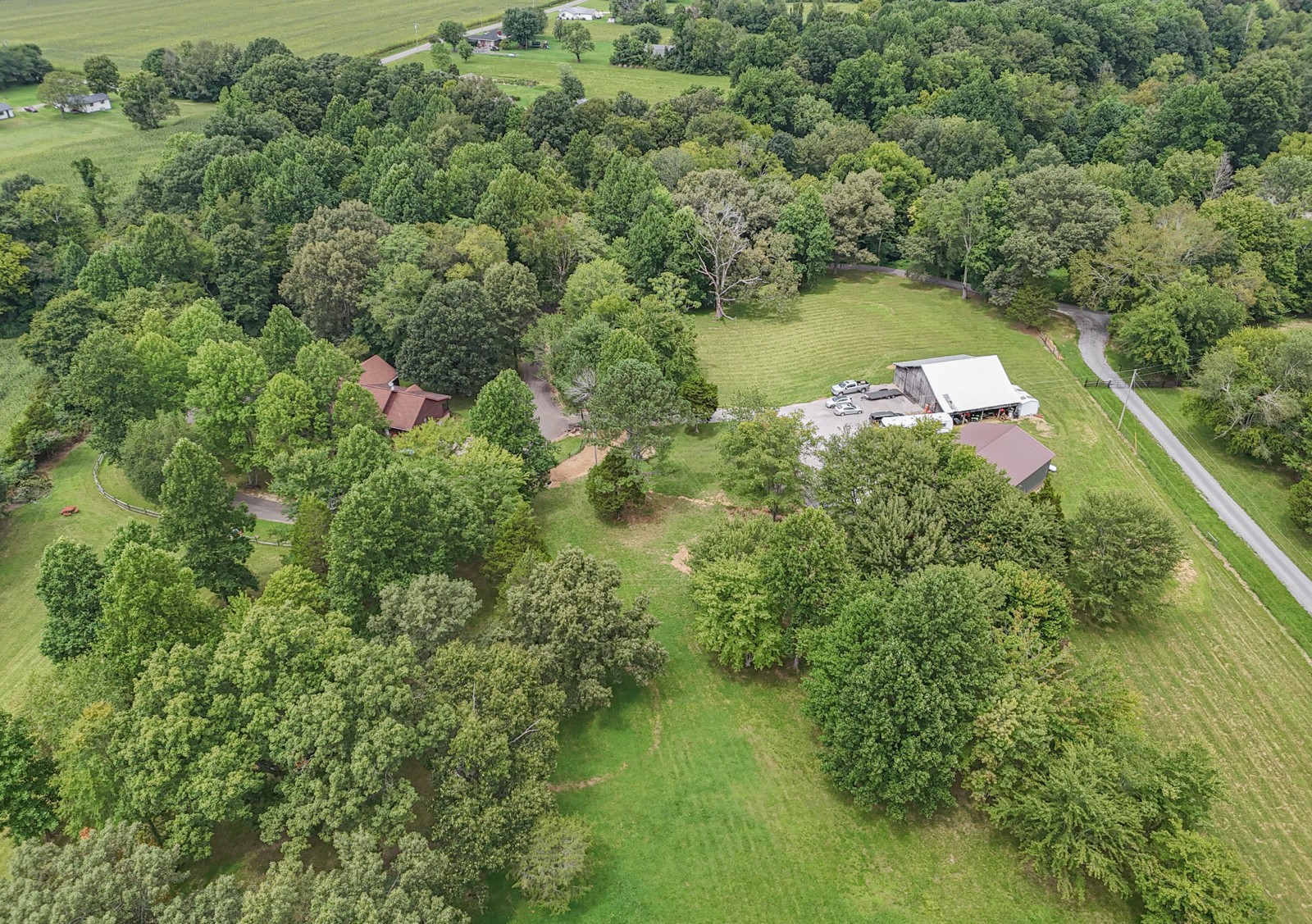 118 Robert Simmons Road Westmoreland, TN 37186 - Photo 67 of 82 an aerial view of residential house with outdoor space and trees around