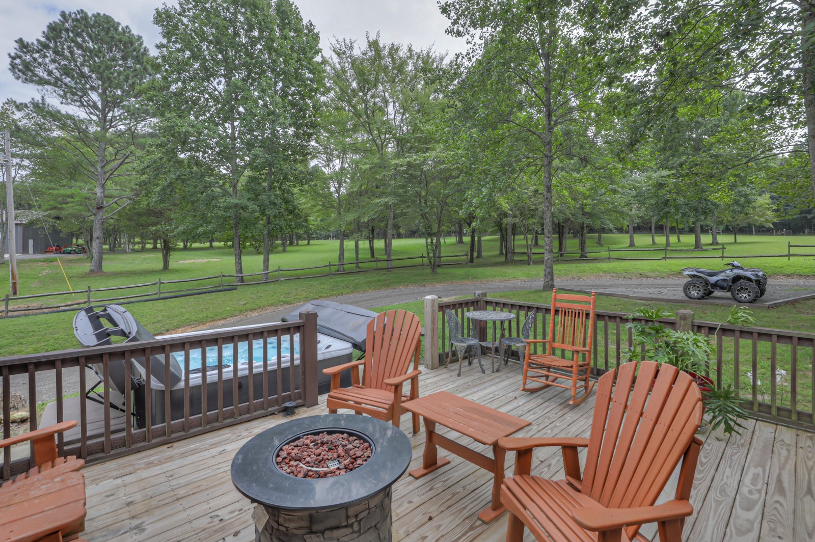118 Robert Simmons Road Westmoreland, TN 37186 - Photo 7 of 82 a view of a wooden deck and a backyard