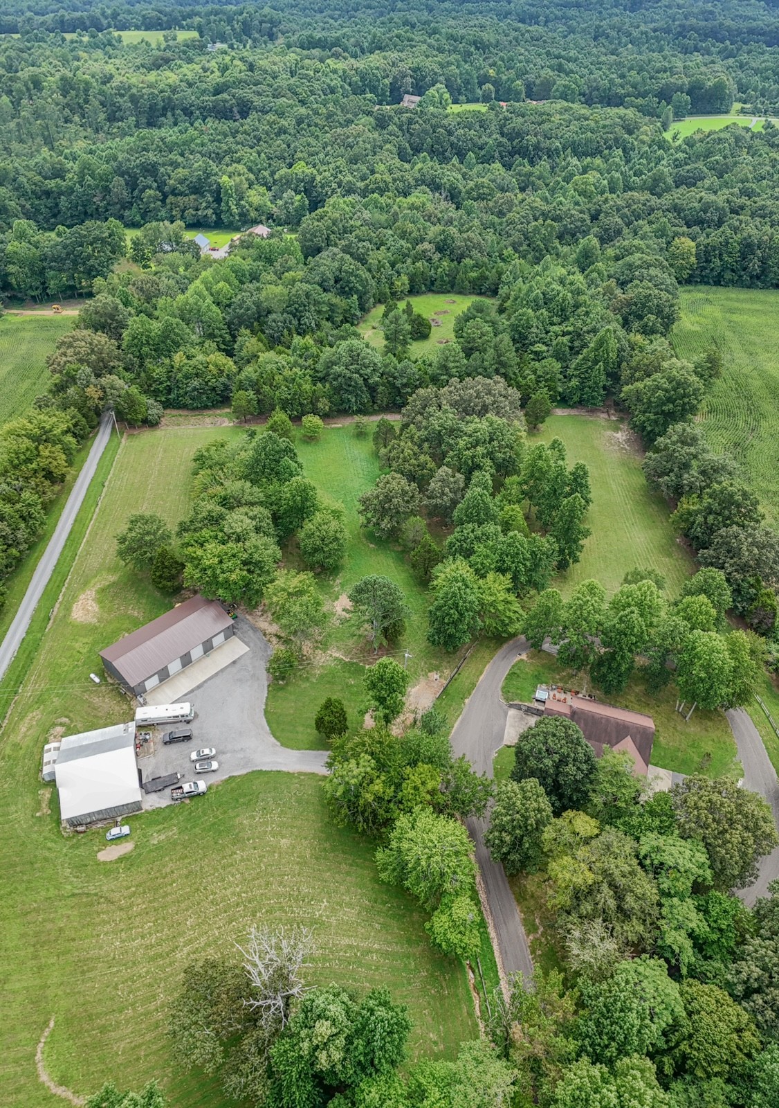 118 Robert Simmons Road Westmoreland, TN 37186 - Photo 72 of 82 an aerial view of a house with a yard and lake view