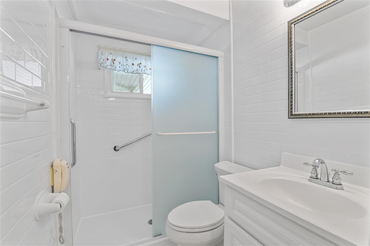 1421 Kelly Road Garner, NC 27529 - Photo 21 of 24 The bathroom was remodeled and features a walk in shower! Bathroom