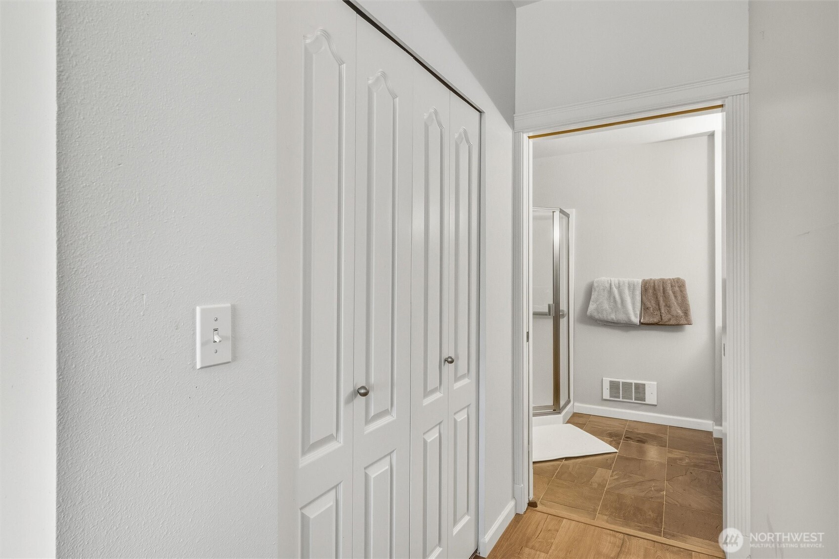 255 West Bakerview Road, Unit B103 Bellingham, WA 98226 - Photo 26 of 40 a view of a hallway with wooden floor and entryway