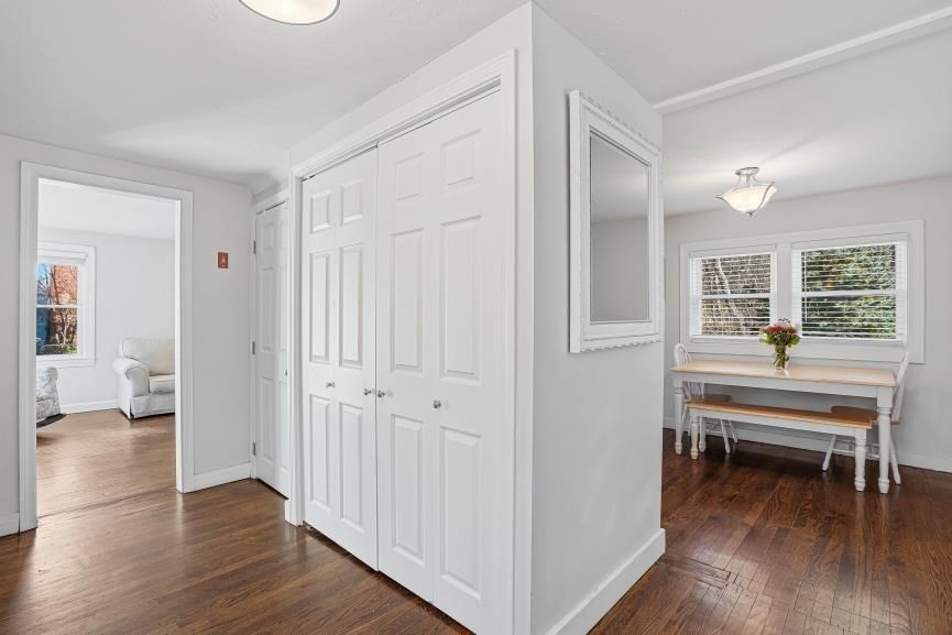 49 Grove Street Upton, MA 01568 - Photo 17 of 39 a view of entryway with wooden floor and windows